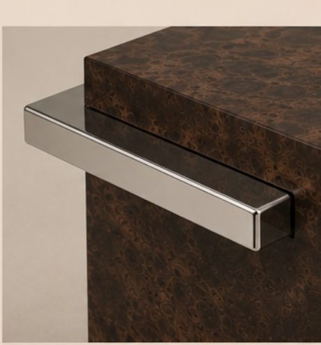 Burl wood and polished steel at the joint